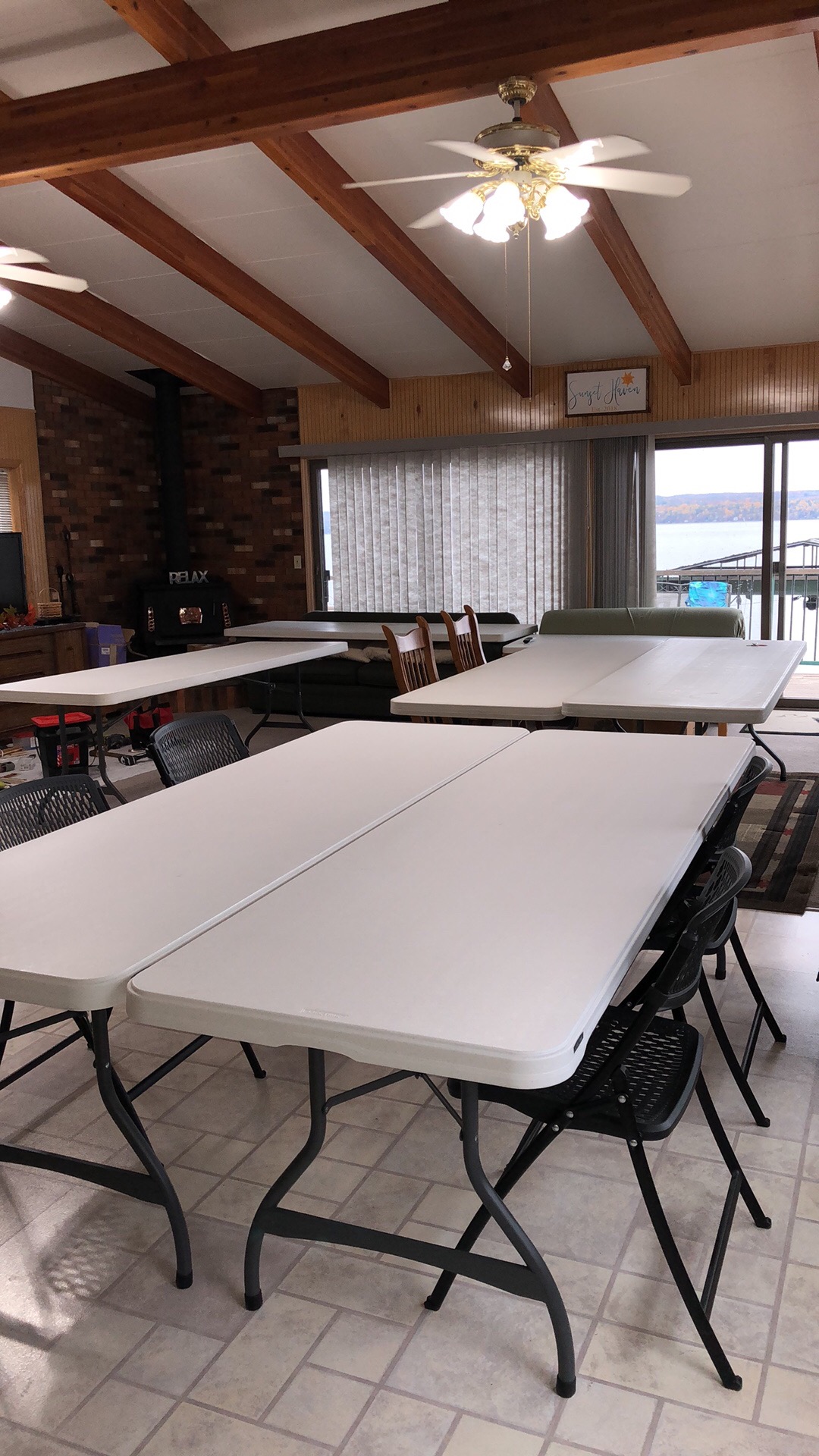 Crafting tables arranged in a bright room with large windows